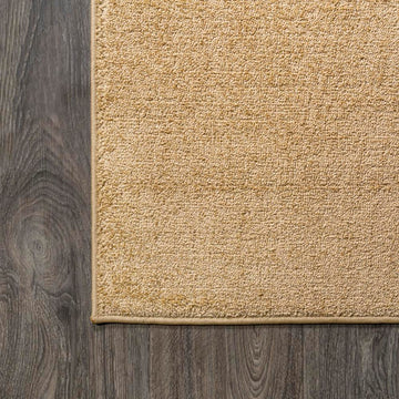Haze Solid Low-pile Area Rug Mustard